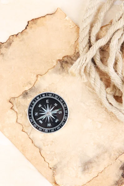Old paper with compass and rope close up — Stock Photo, Image