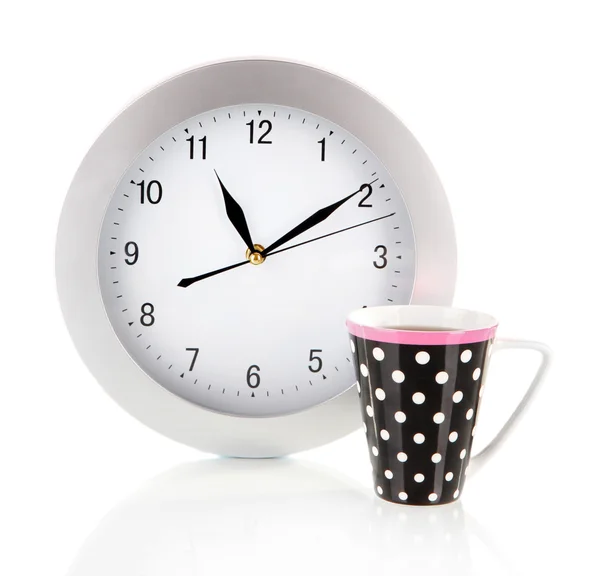 Cup tea and clock isolated on white — Stock Photo, Image