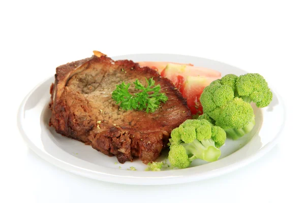 Stuk gebakken vlees op plaat geïsoleerd op wit — Stockfoto