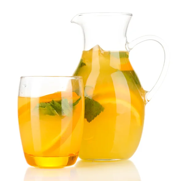 Orange lemonade in pitcher and glass isolated on white — Stock Photo, Image