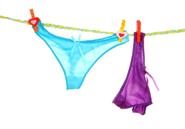 Women's panties hanging on rope isolated on white — Stock Photo, Image