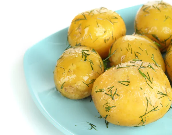 Gotowane ziemniaki na płytkę na białym tle — Zdjęcie stockowe
