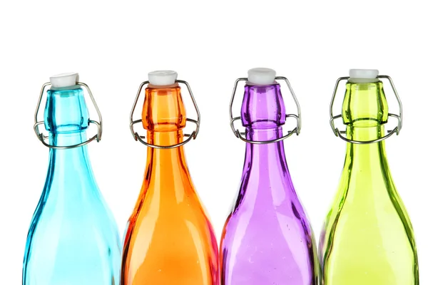 Colorful bottles isolated on white — Stock Photo, Image