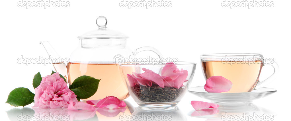 Kettle and cup of tea from tea rose isolated on white