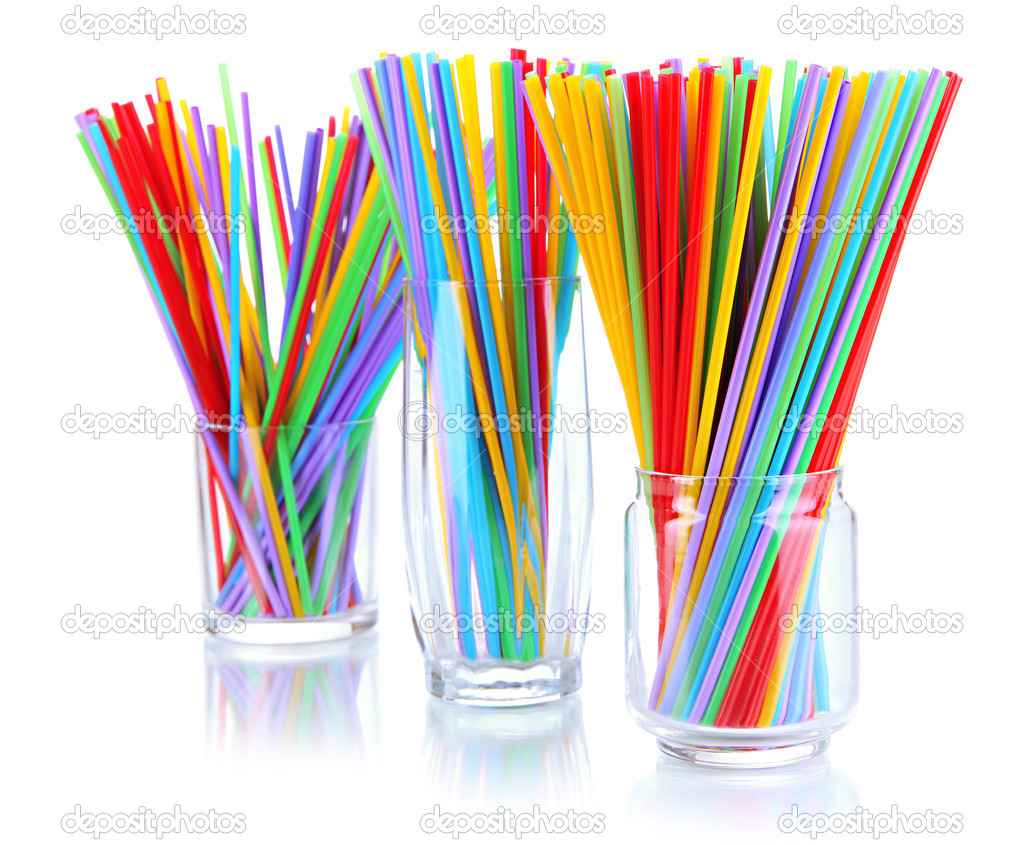 Many straws in glasses isolated on white