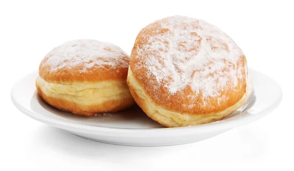 Leckere Donuts auf Teller, isoliert auf weißem — Stockfoto
