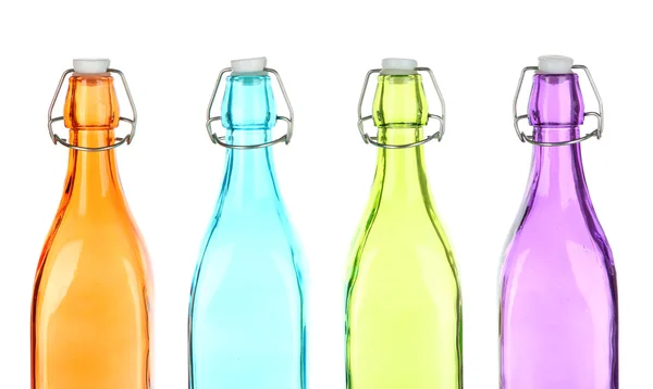 Botellas coloridas aisladas en blanco — Foto de Stock