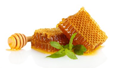 sweet honeycombs with mint and drizzler, isolated on white