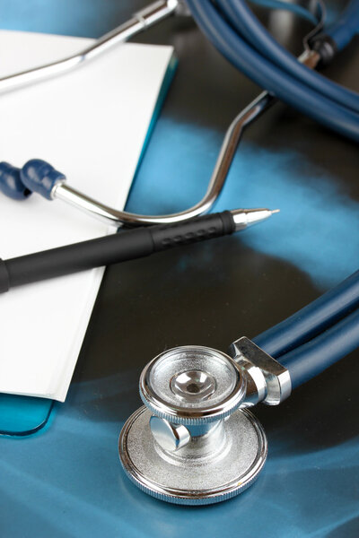 Medical stethoscope on an x-ray picture close up