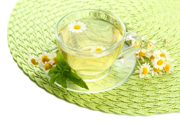 Cup of herbal tea with wild camomiles and mint, isolated on white — Stock Photo, Image