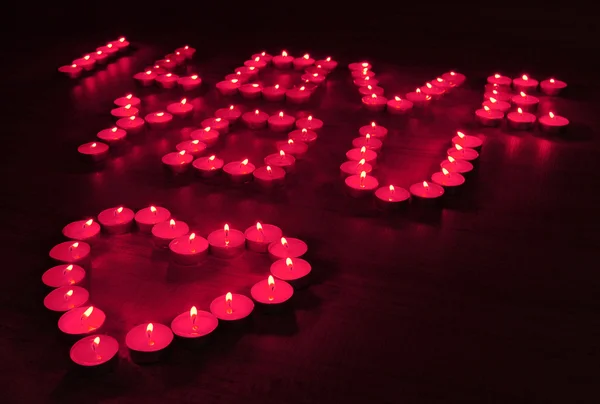浪漫蜡烛上黑的背景 — 图库照片