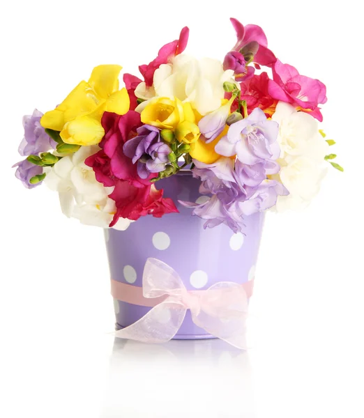 Beautiful bouquet of freesias in pail, isolated on white — Stock Photo, Image