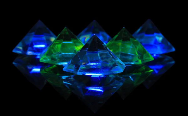 Diamonds on dark color background — Stock Photo, Image