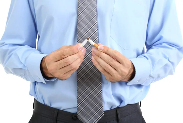 Geschäftsmann bricht die Zigarette ab, isoliert auf weißem Grund — Stockfoto