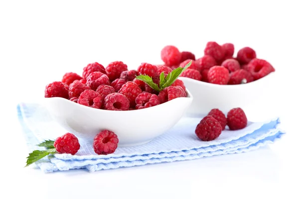 Ripe sweet raspberries in bowls, isolated on white — Stock Photo, Image