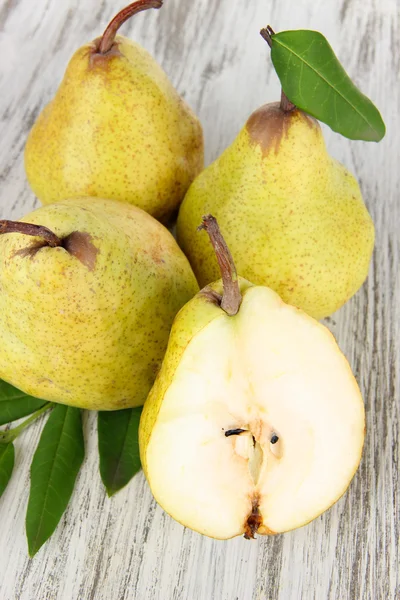 Pears on wooden background — Stock Photo, Image