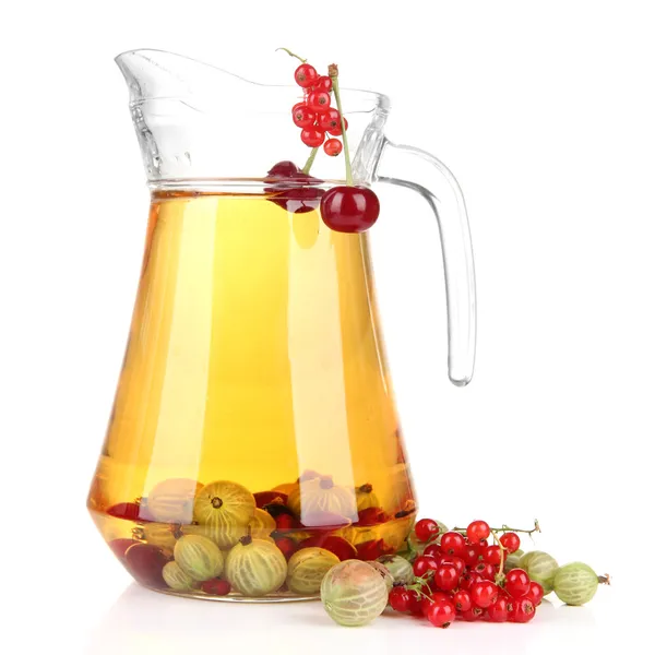 Glass pitcher of compote with different summer berries isolated on white — Stock Photo, Image