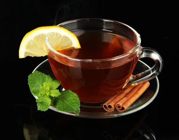 Cup of tea with lemon isolated on black — Stock Photo, Image