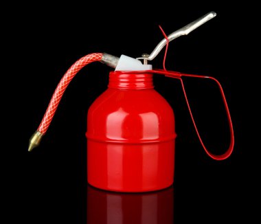 Red oil can, isolated on black clipart