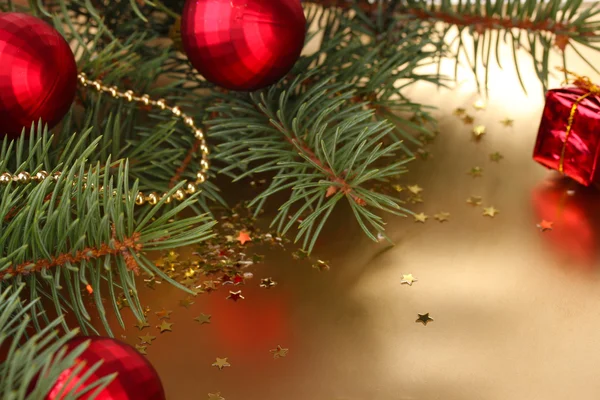 Christmas tree with beautiful New Year's balls on table — Stock Photo, Image