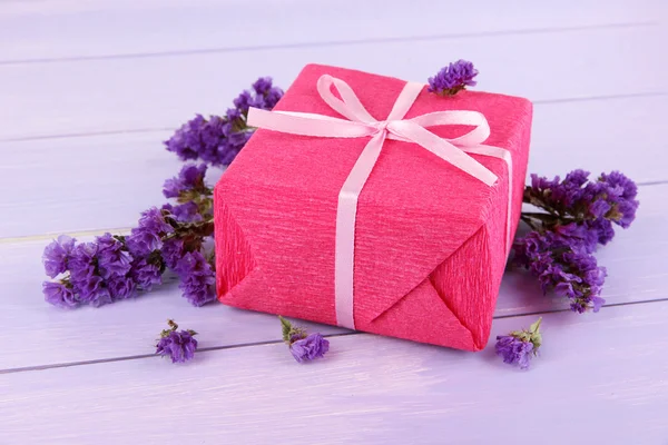 Romantic parcel on wooden background — Stock Photo, Image