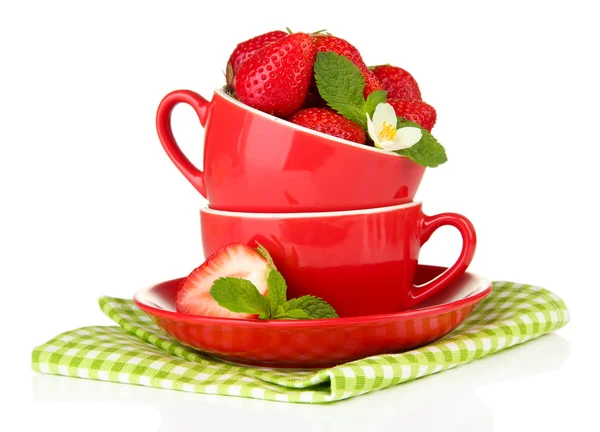 Ripe sweet strawberries in red cups, isolated on white — Stock Photo, Image