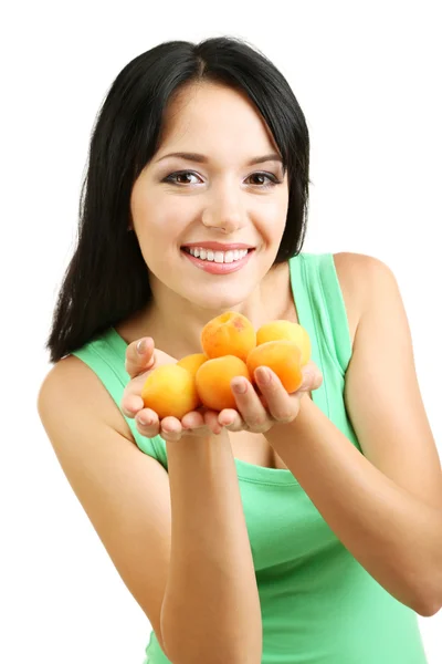 Ragazza con albicocche fresche isolate su bianco — Foto Stock