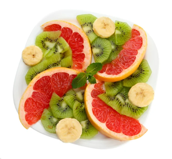 Sortiment krájeného ovoce na desce, izolované na bílém — Stock fotografie