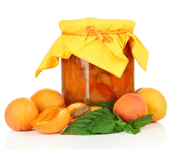 Apricot jam in glass jar and fresh apricots, isolated on white — Stock Photo, Image