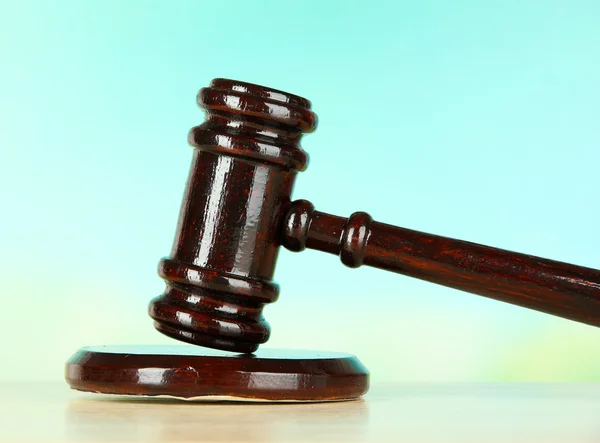 Judges gavel on wooden table on light background — Stock Photo, Image