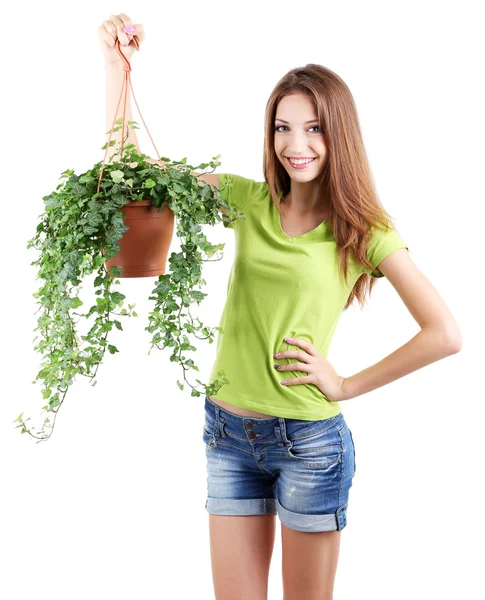 Bella ragazza con fiore in vaso isolato su bianco — Foto Stock