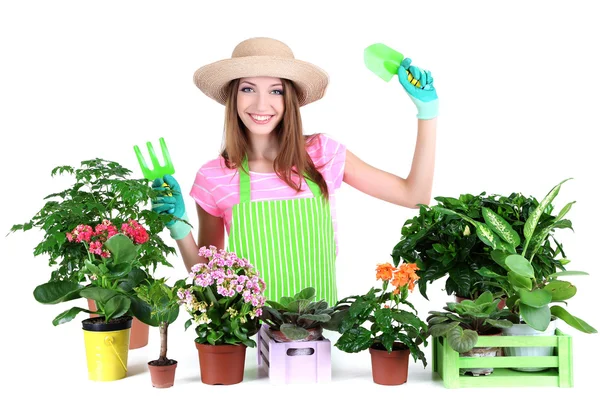 Jardineiro menina bonita com flores isoladas em branco — Fotografia de Stock