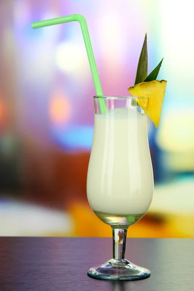 Pina colada drink in cocktail glass, on bright background — Stock Photo, Image