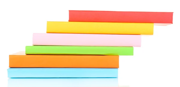 Stapel mehrfarbiger Bücher isoliert auf weißem Papier — Stockfoto