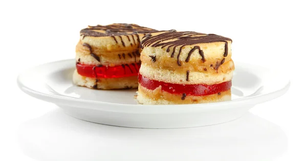 Gustose torte biscottate su piatto, isolate su bianco — Foto Stock