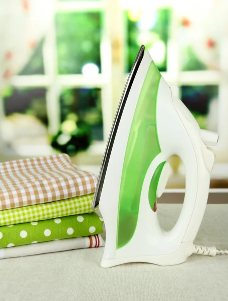 Steam iron on bright background — Stock Photo, Image