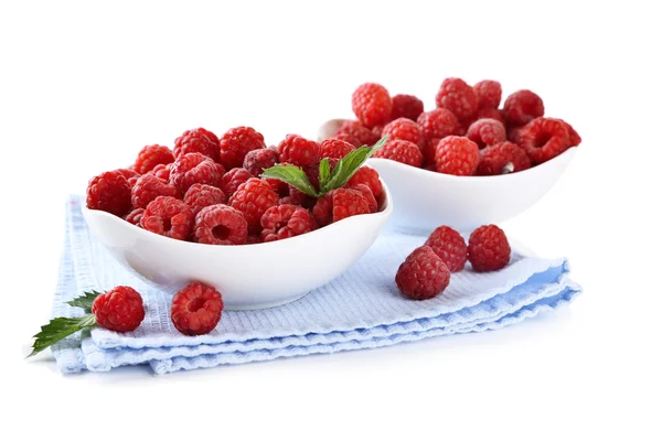 Ripe sweet raspberries in bowls, isolated on white — Stock Photo, Image