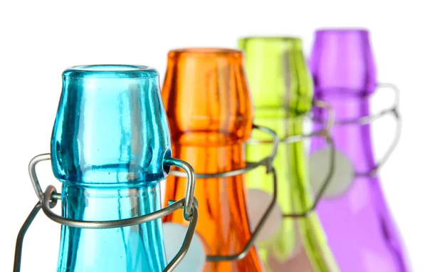 Botellas coloridas aisladas en blanco — Foto de Stock