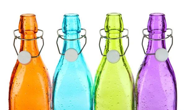 Botellas coloridas aisladas en blanco — Foto de Stock