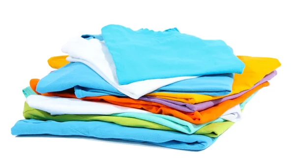 Neatly folded shirts isolated on white — Stock Photo, Image