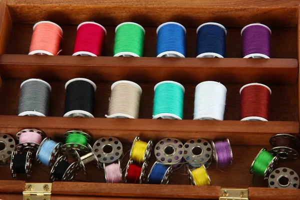 Sewing kit in wooden box close-up — Stock Photo, Image