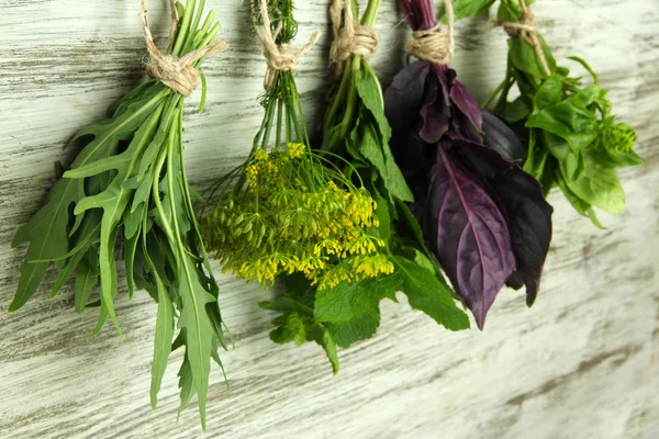 Fresh herbs on wooden background — Stock Photo, Image