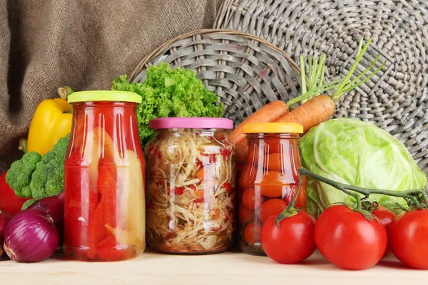 Fresh vegetables and canned on table close up — Stock Photo, Image