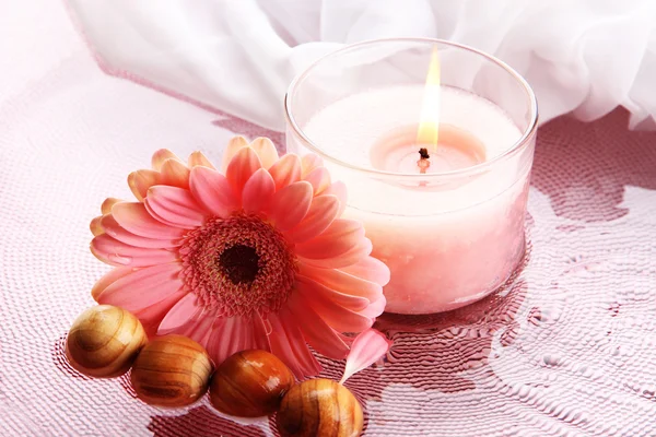 Beautiful pink candle with flower in water — Stock Photo, Image