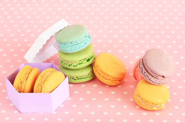 Gentle macaroons on pink background — Stock Photo, Image