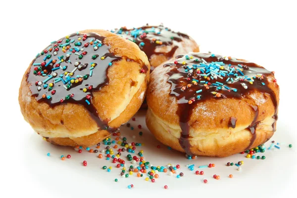 Smakelijke donuts met chocolade, geïsoleerd op wit — Stockfoto