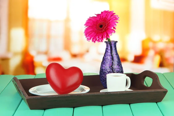 Wooden tray with breakfast, on bright background — Stock Photo, Image