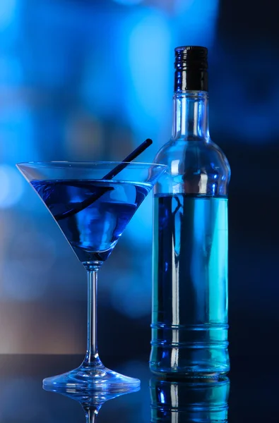 Glass of cocktail on bright background — Stock Photo, Image