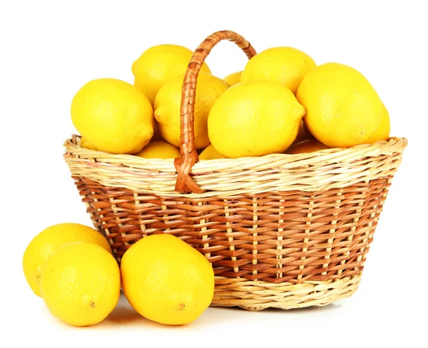 Ripe lemons in wicker basket isolated on white — Stock Photo, Image