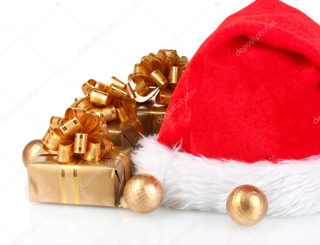 Beautiful Christmas hat, gifts and Christmas balls isolated on white